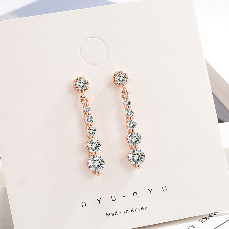 Boucles d'oreilles World Kim Ear en Zircon avec goutte d'eau