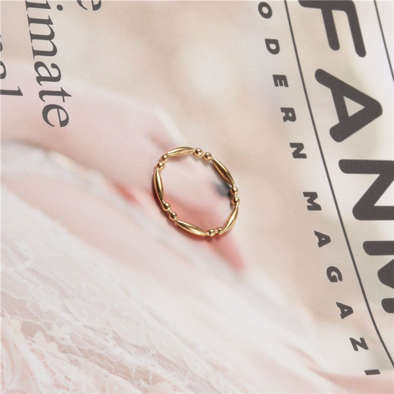 Round Beads And Oval Bead Titanium Rings