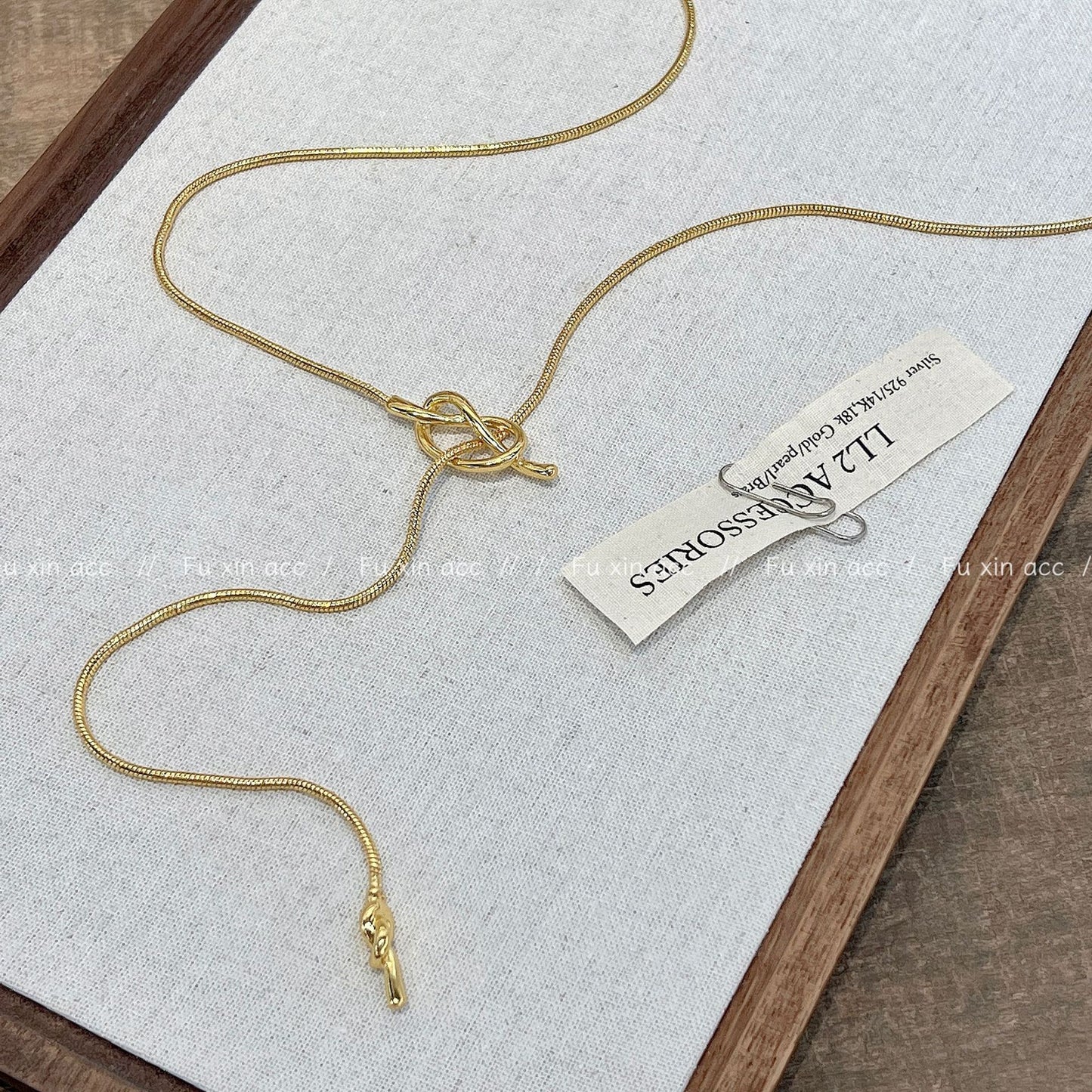 Colliers de luxe légers avec chaîne de pull à nœud marin