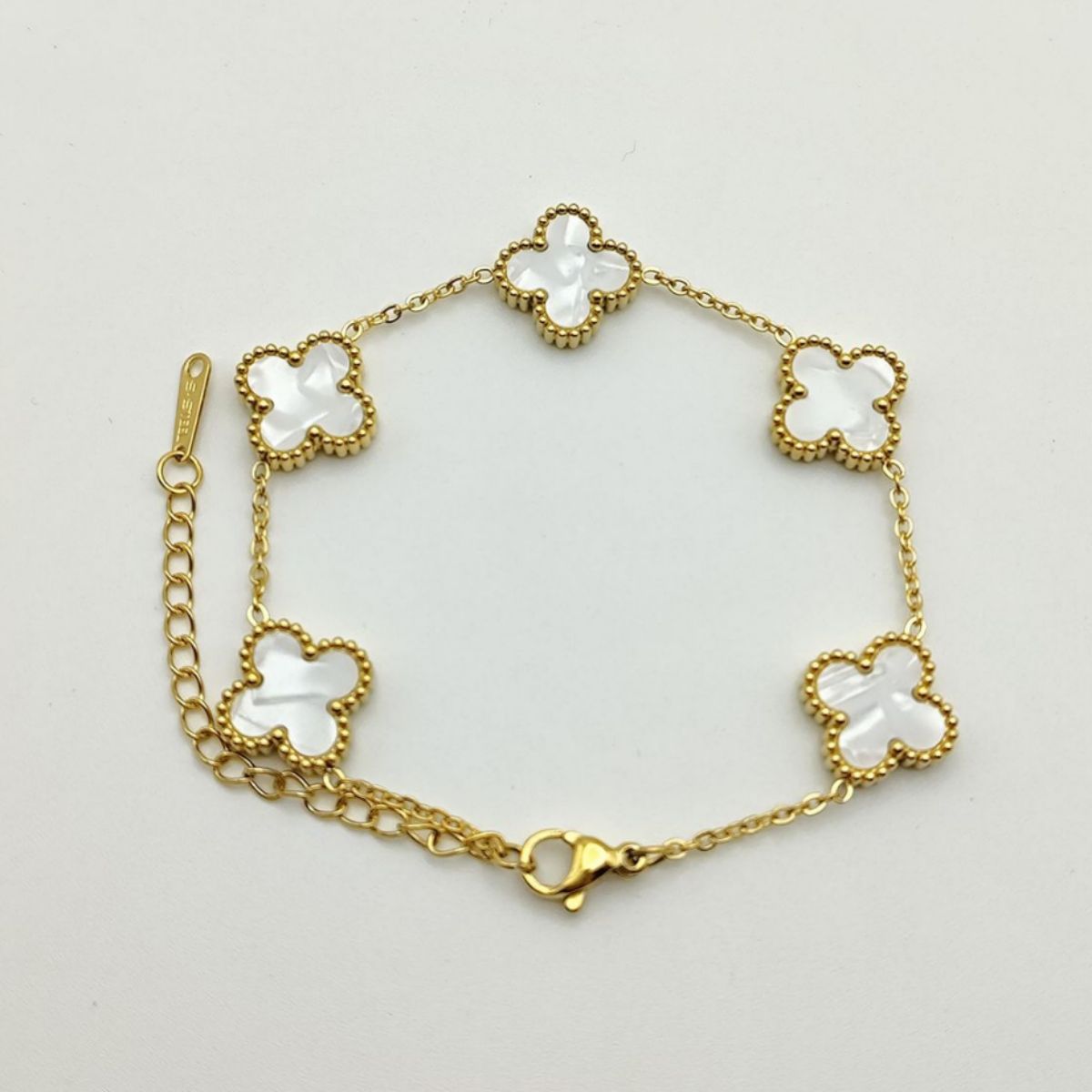 Bracelets d'ornement de rétention de couleur double face en or trèfle pour femmes