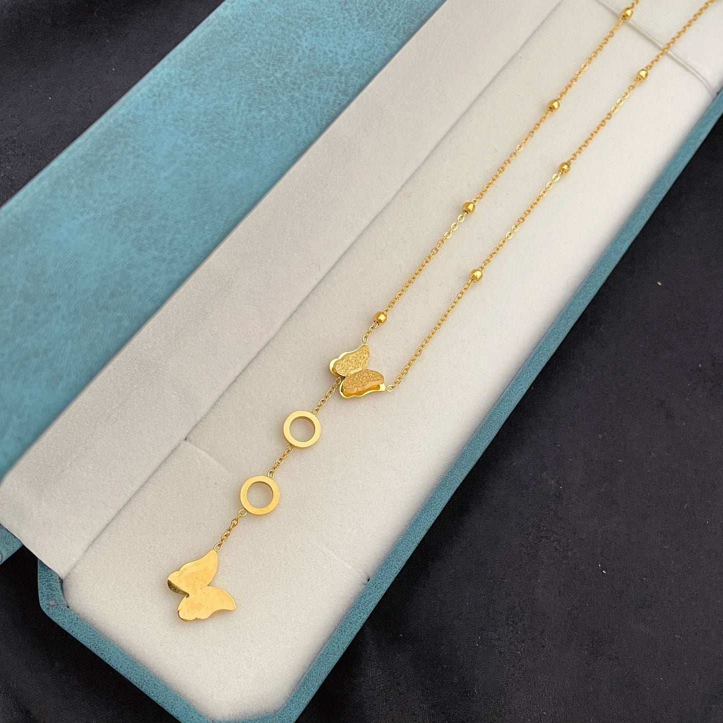 Stahl-Ketten mit Schmetterlingsquasten und verblassenden Perlen