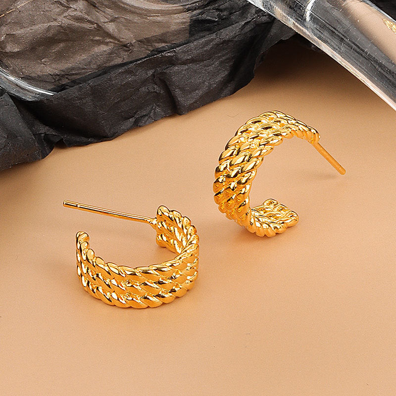 Boucles d'oreilles rétro torsadées simples et élégantes de style coréen