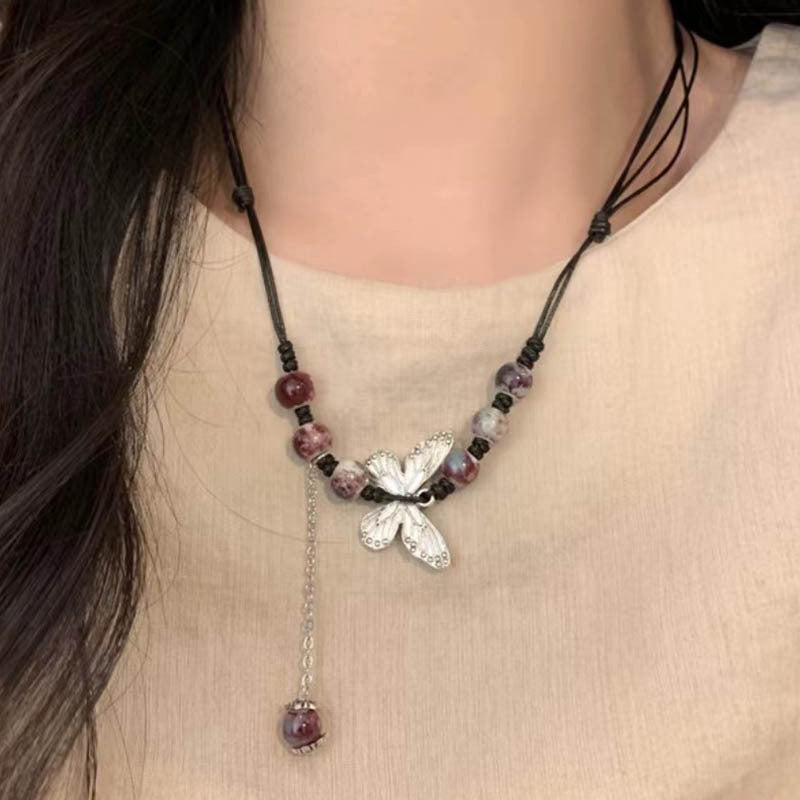 Colliers de style ethnique avec pompon papillon en perles chinoises