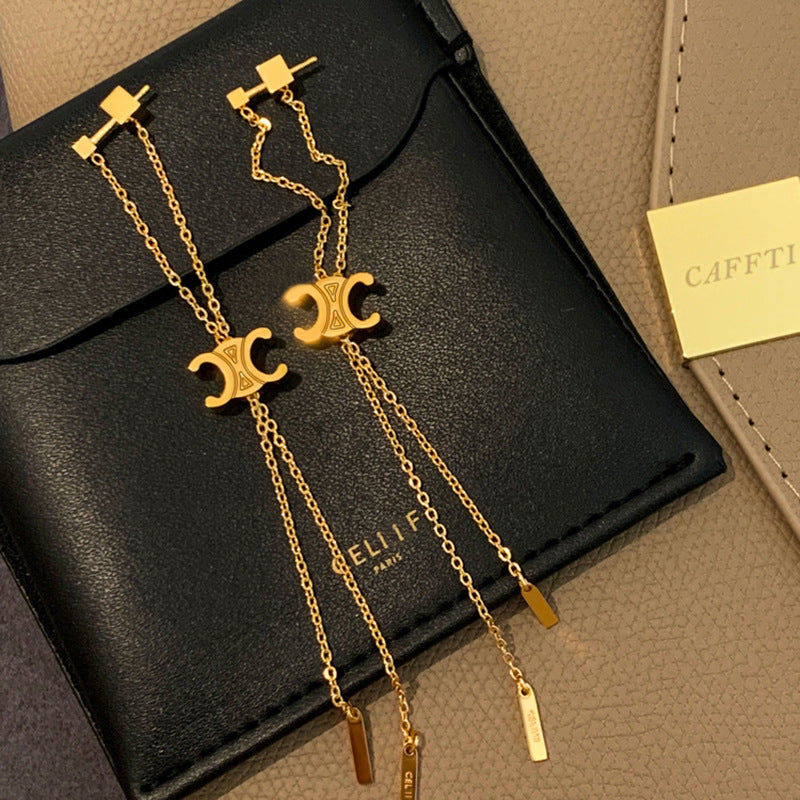 Boucles d'oreilles de luxe légères à pampilles avec lettres géométriques, de haute qualité