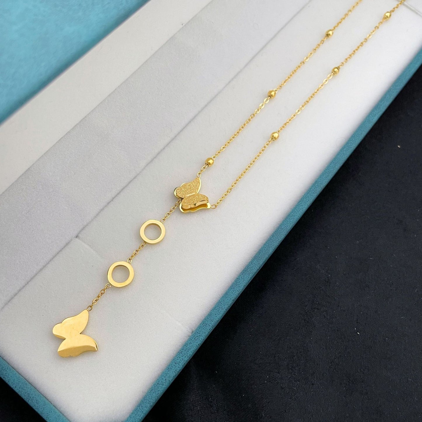 Stahl-Ketten mit Schmetterlingsquasten und verblassenden Perlen