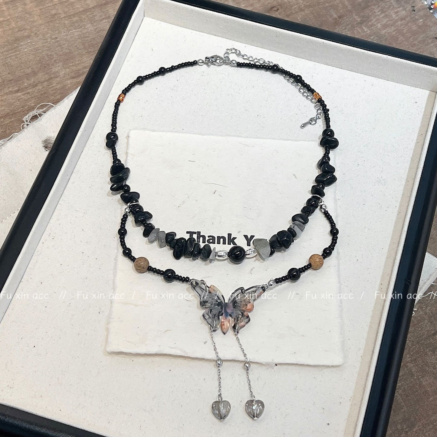 Colliers longs papillon de luxe léger en perles de pierre