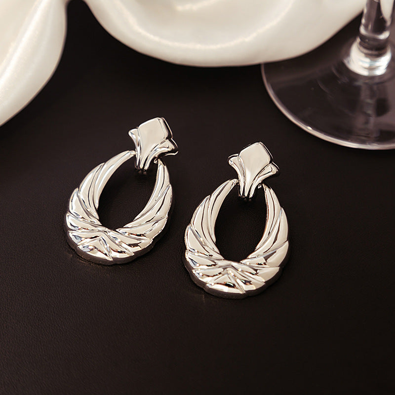 Boucles d'oreilles creuses en forme de U à texture plaquée or pour femmes