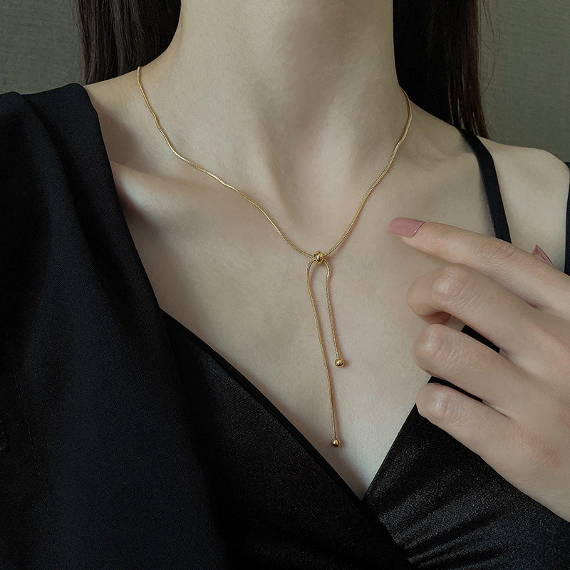 Tirez la chaîne de clavicule féminine, colliers simples et légers