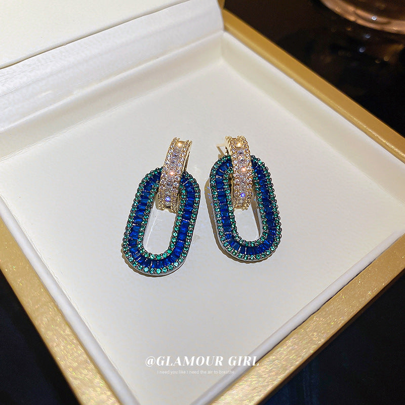 Boucles d'oreilles ovales en Zircon plaqué or avec aiguille en argent