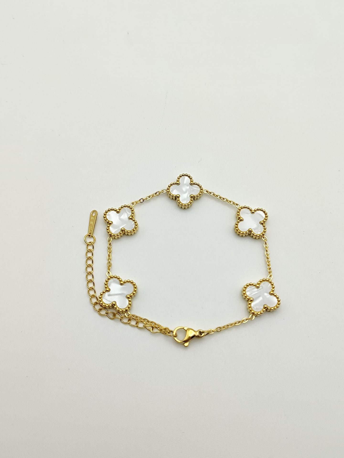 Bracelets d'ornement de rétention de couleur double face en or trèfle pour femmes