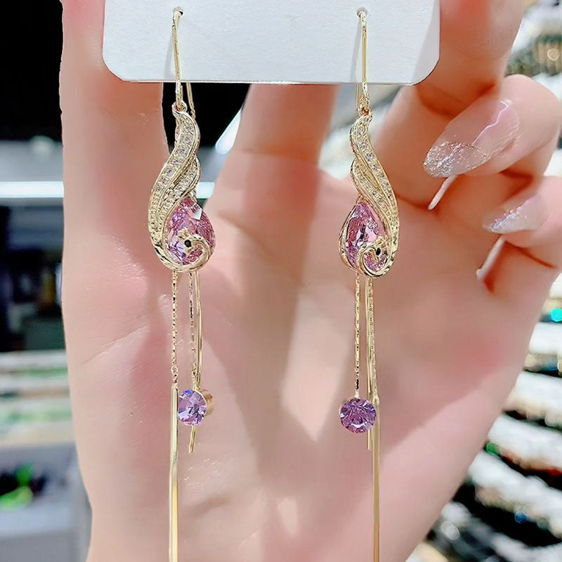 Boucles d'oreilles amincissantes en cristal paon pour femmes, longues pampilles, visage