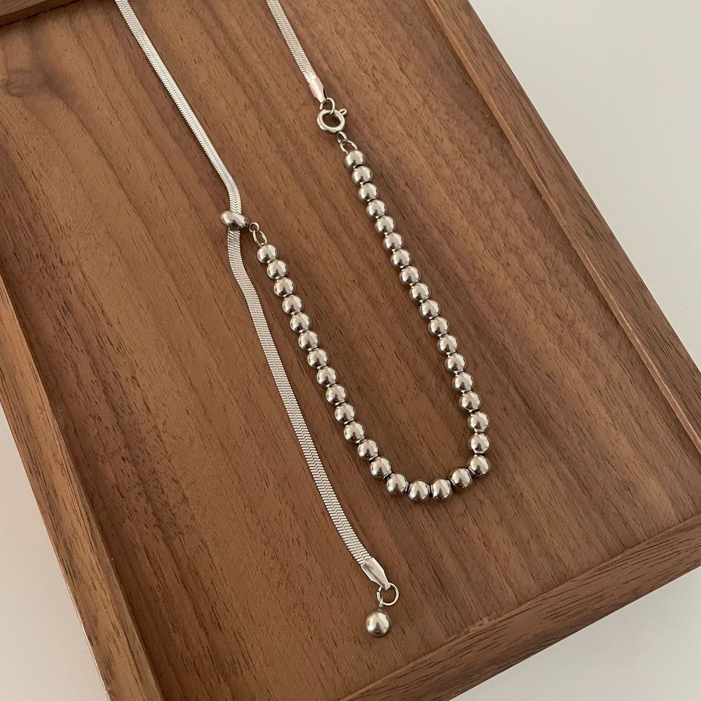 Colliers de niche en chaîne d'os de serpent en acier titane Of Sier