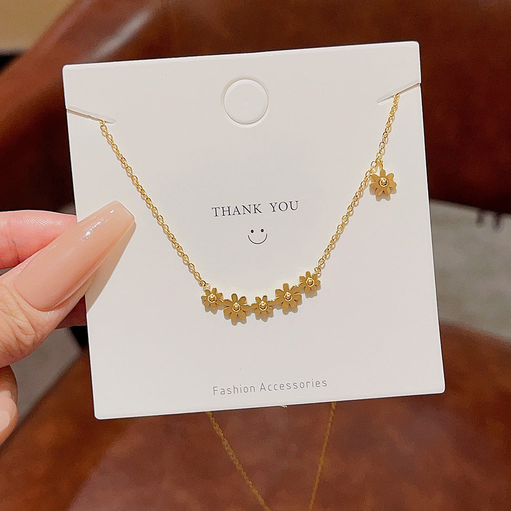 Colliers de style coréen en acier titane doré petite marguerite