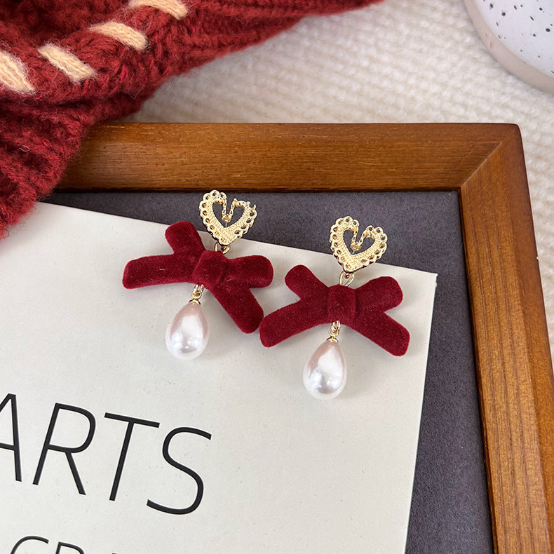 Flocking Temperament Style Flower Bow Tie Tassel Earrings