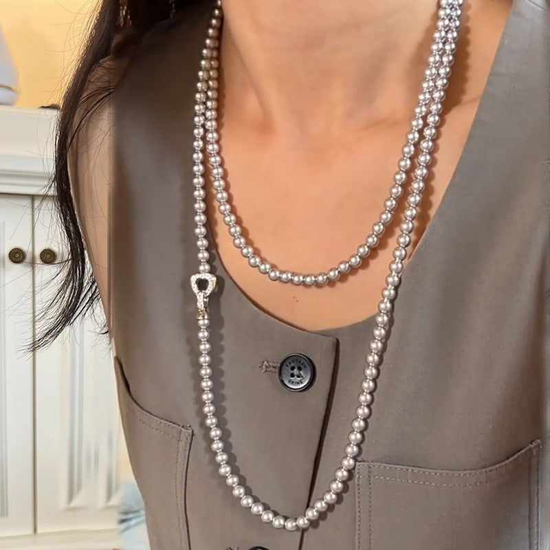 Sold Women's Pearl Sweater Chain