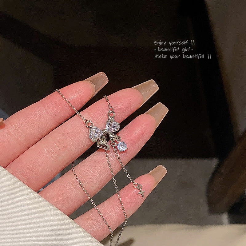 Schlüsselbeinhalsketten aus raffiniertem Zirkon mit langer Quaste und Schleife