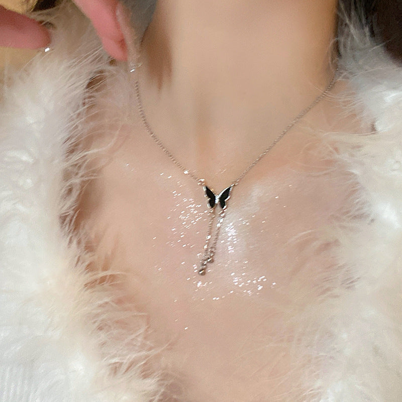 Desire Wind – colliers à la mode avec pompon papillon noir pour femmes