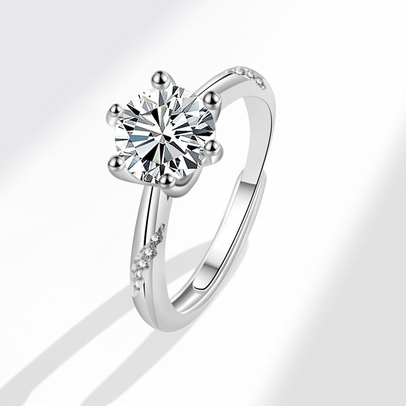 Acht weibliche Karat-Ringe mit Herzen und Pfeilen