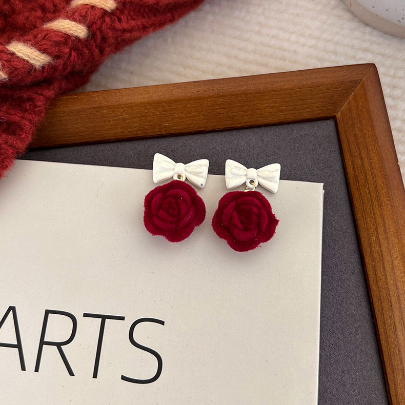 Flocking Temperament Style Flower Bow Tie Tassel Earrings
