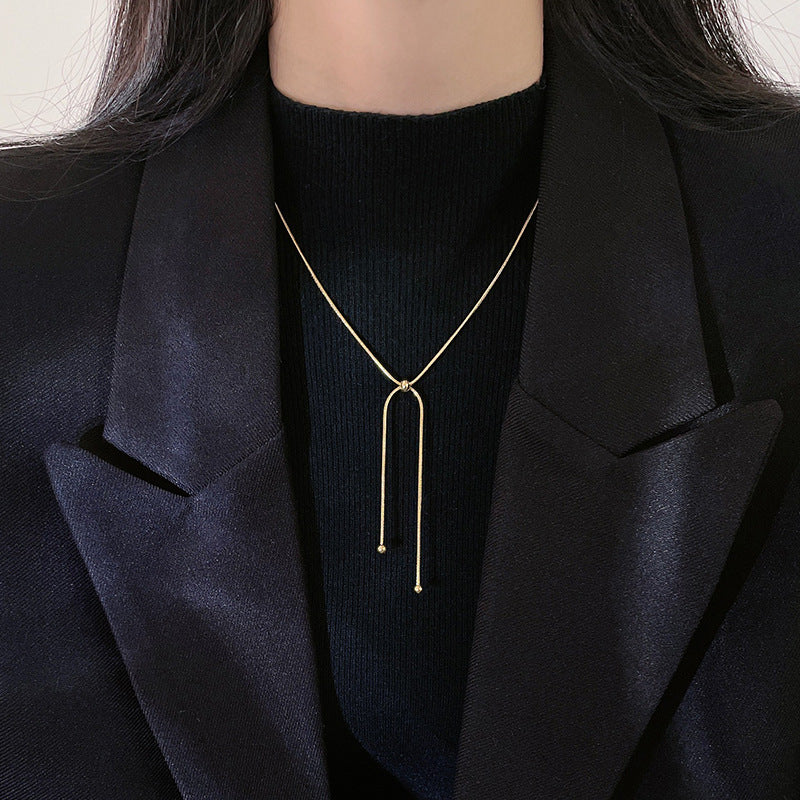 Tirez la chaîne de clavicule féminine, colliers simples et légers