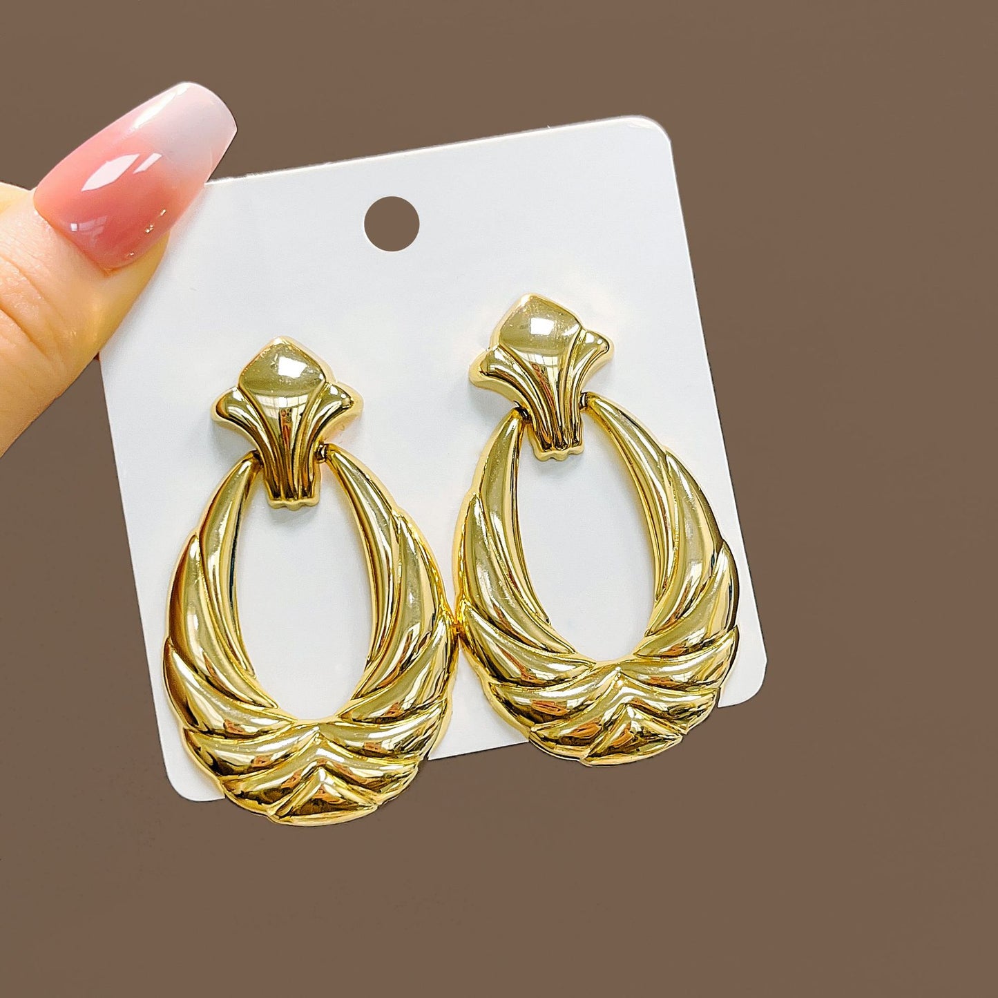 Boucles d'oreilles creuses en forme de U à texture plaquée or pour femmes