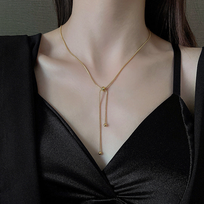 Tirez la chaîne de clavicule féminine, colliers simples et légers