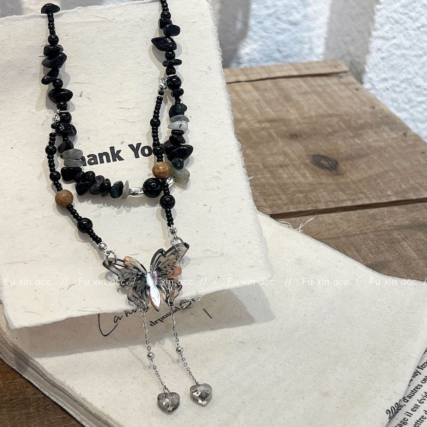 Colliers longs papillon de luxe léger en perles de pierre