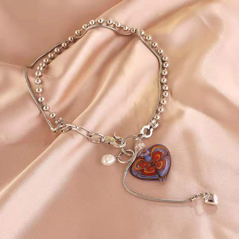 Colliers tendance en perles de verre, Design minoritaire, grand amour