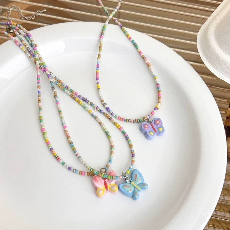 Pendentif papillon pour femmes, colliers d'été doux et frais de couleur Dopamine
