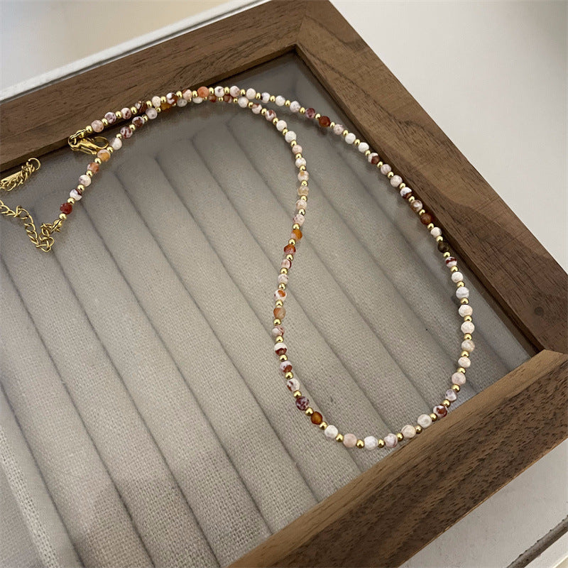 Femmes et hommes perles pour la lumière luxe minorité tempérament de haute qualité colliers en titane