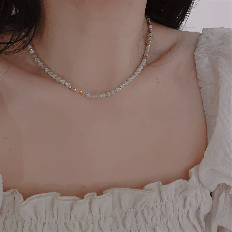 Femmes et hommes perles pour la lumière luxe minorité tempérament de haute qualité colliers en titane