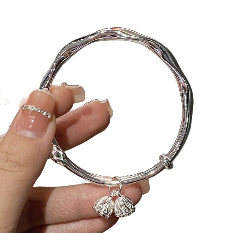 Women's Lotus Seedpod Flower Bud Light Simple Mobius Bracelet