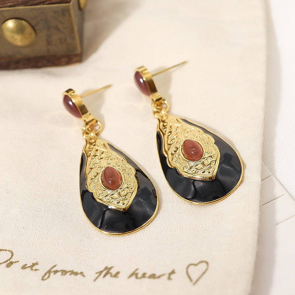 Boucles d'oreilles en opale incrustée de texture sculptée exagérée