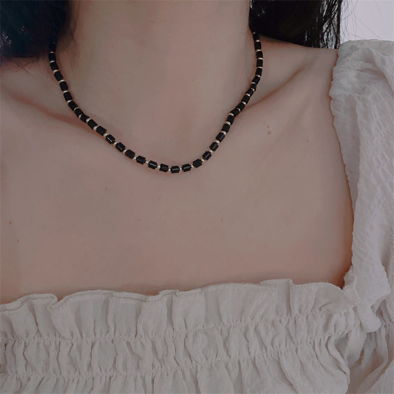 Femmes et hommes perles pour la lumière luxe minorité tempérament de haute qualité colliers en titane