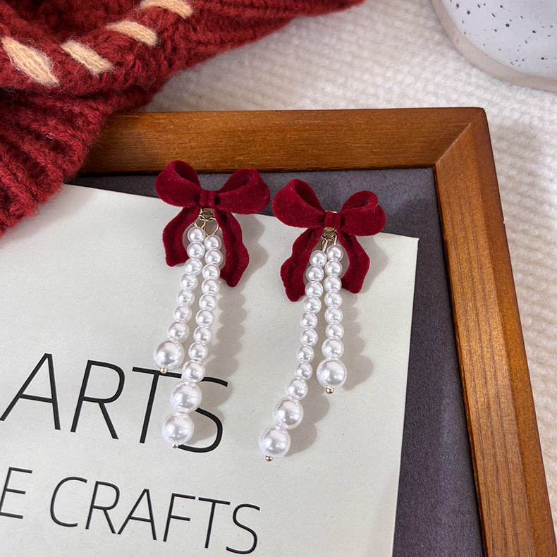 Flocking Temperament Style Flower Bow Tie Tassel Earrings