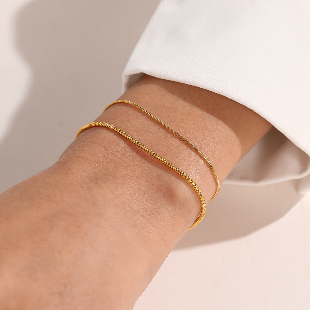 Nischendesign-Titan-Schlangenknochenarmbänder für Damen aus Stahl