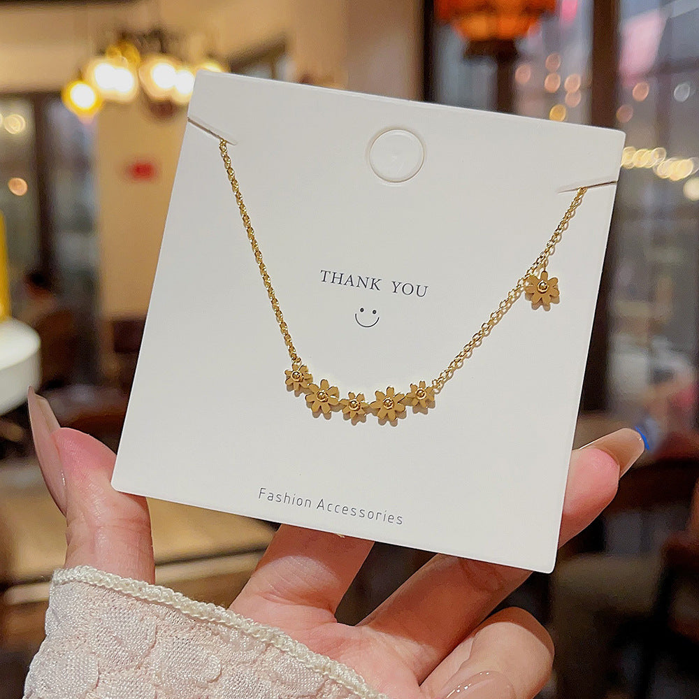 Colliers de style coréen en acier titane doré petite marguerite