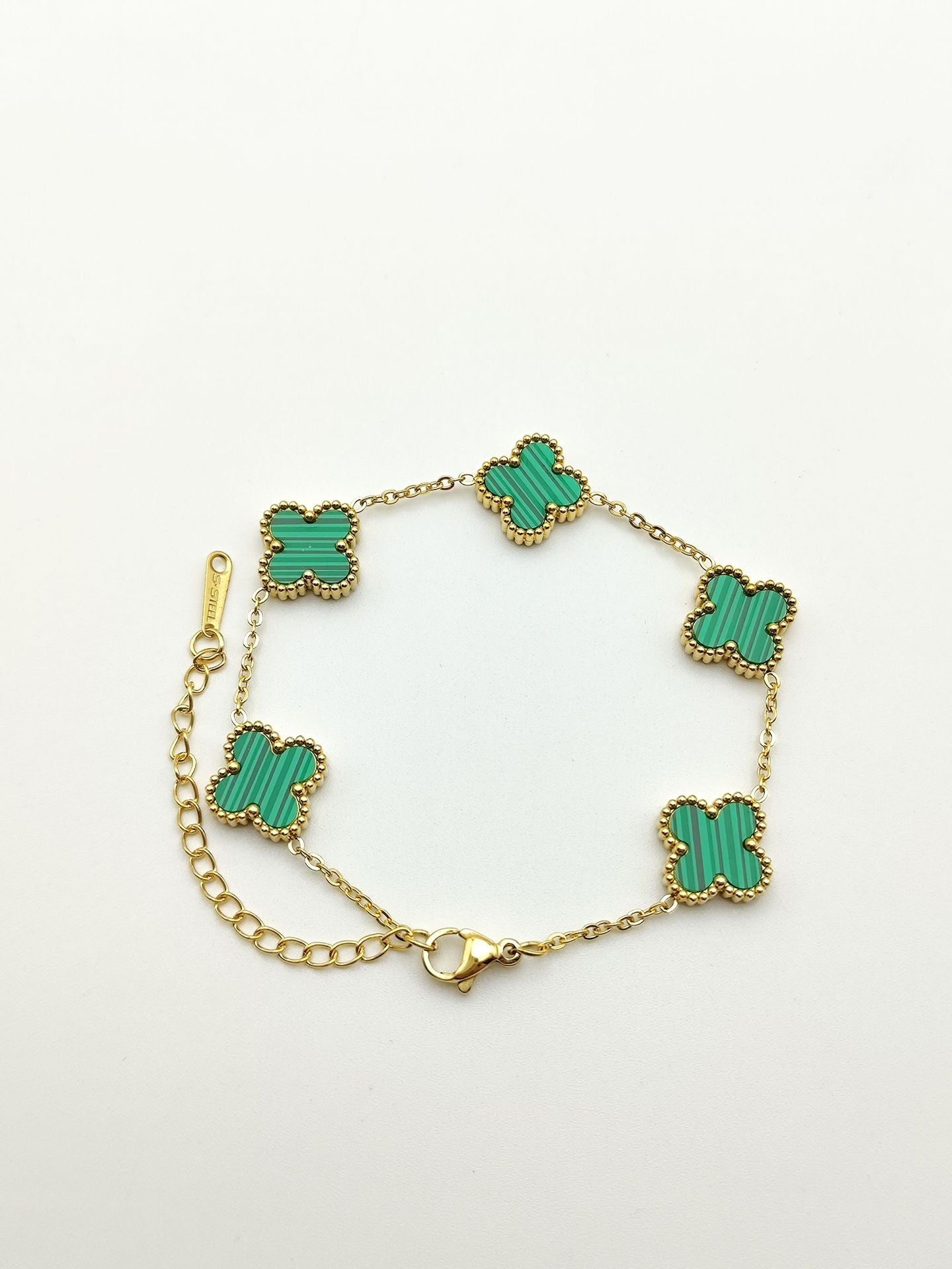 Bracelets d'ornement de rétention de couleur double face en or trèfle pour femmes