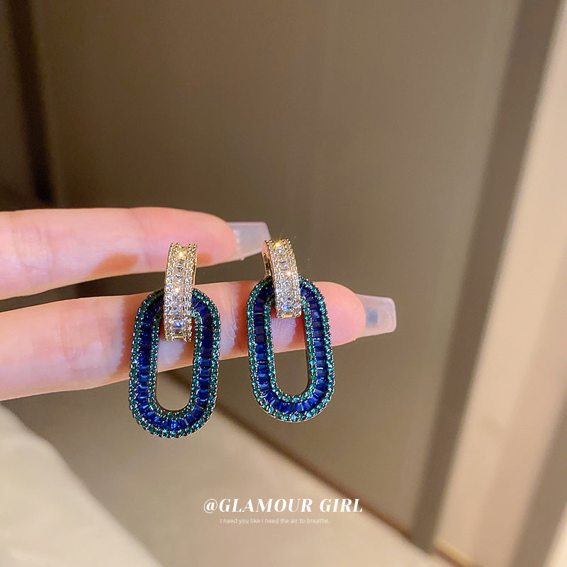 Boucles d'oreilles ovales en Zircon plaqué or avec aiguille en argent
