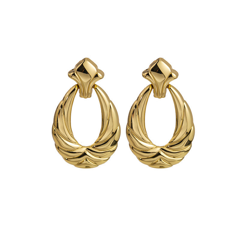 Boucles d'oreilles creuses en forme de U à texture plaquée or pour femmes