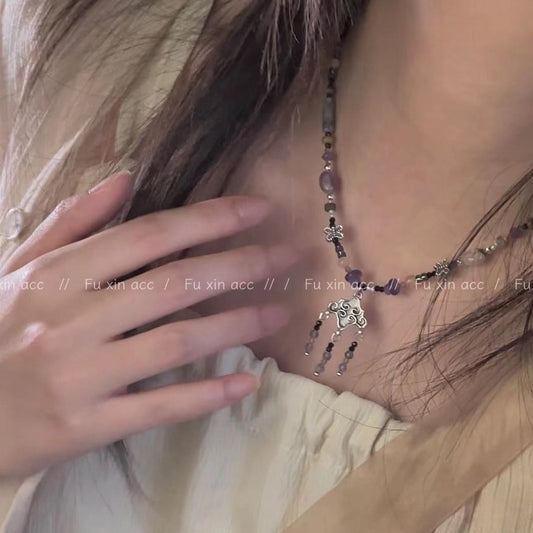 Style traditionnel léger luxe rétro minorité violet Totem gland colliers