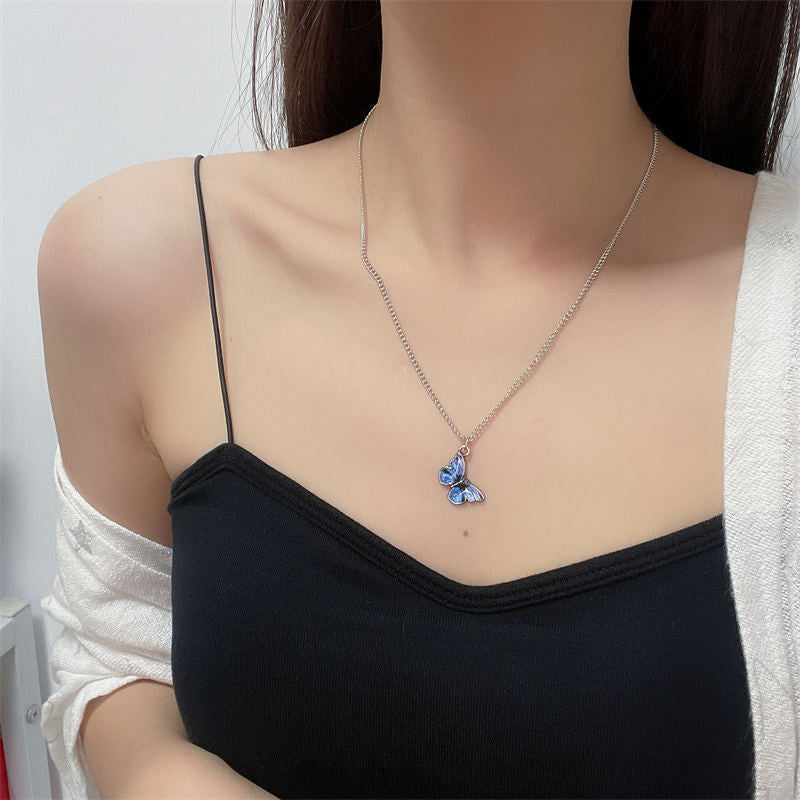 Colliers à pendentif papillon goutte à goutte d'huile fantaisie colorée pour femmes