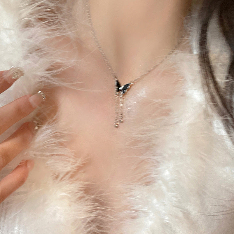 Desire Wind – colliers à la mode avec pompon papillon noir pour femmes
