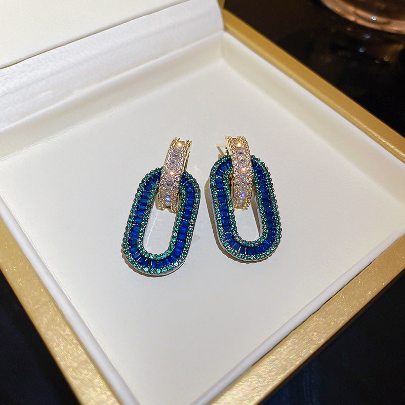 Boucles d'oreilles ovales en Zircon plaqué or avec aiguille en argent