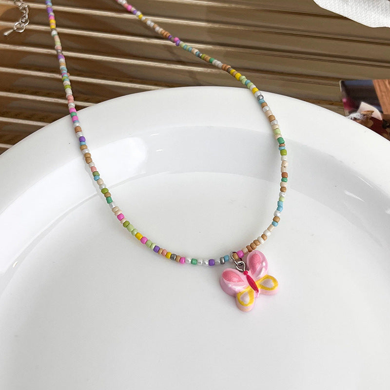Pendentif papillon pour femmes, colliers d'été doux et frais de couleur Dopamine
