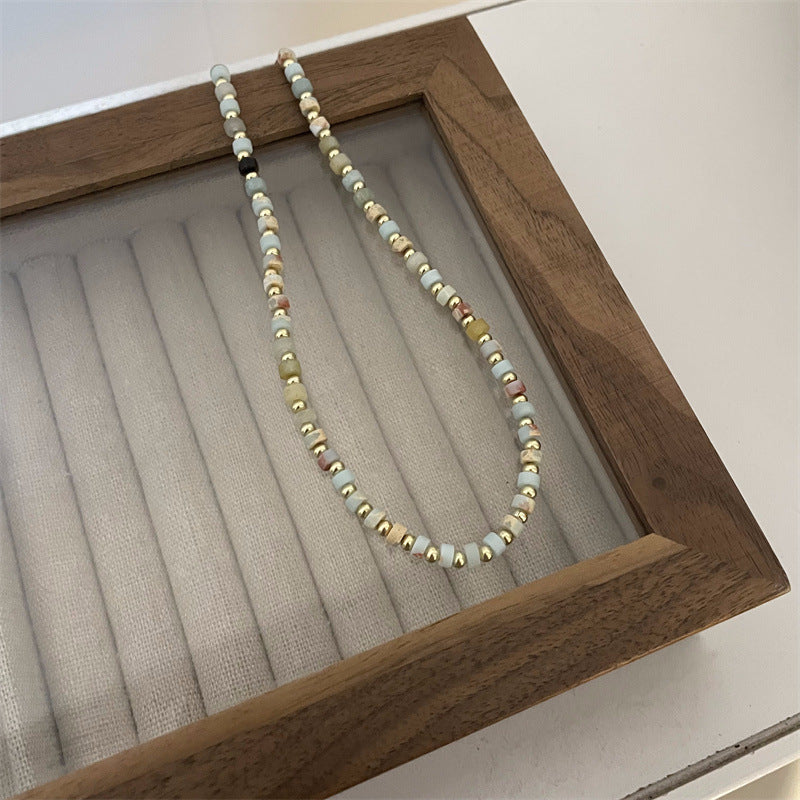 Femmes et hommes perles pour la lumière luxe minorité tempérament de haute qualité colliers en titane