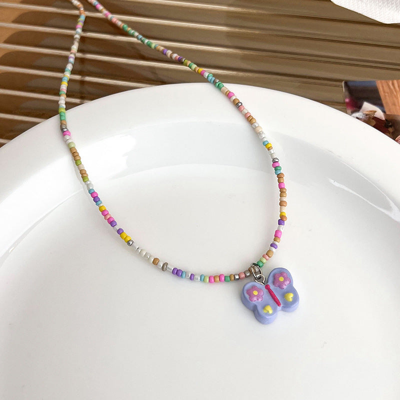 Pendentif papillon pour femmes, colliers d'été doux et frais de couleur Dopamine