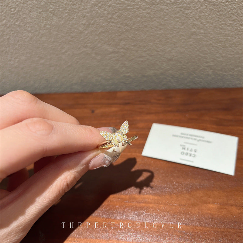 Anneaux de conception de niche de marée de papillon de perle de Zircon