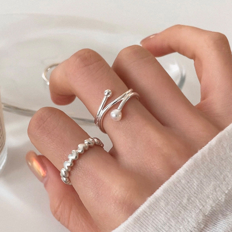 Herzförmige offene Ringe aus Metall mit offenem Anzug und weiblichem Design