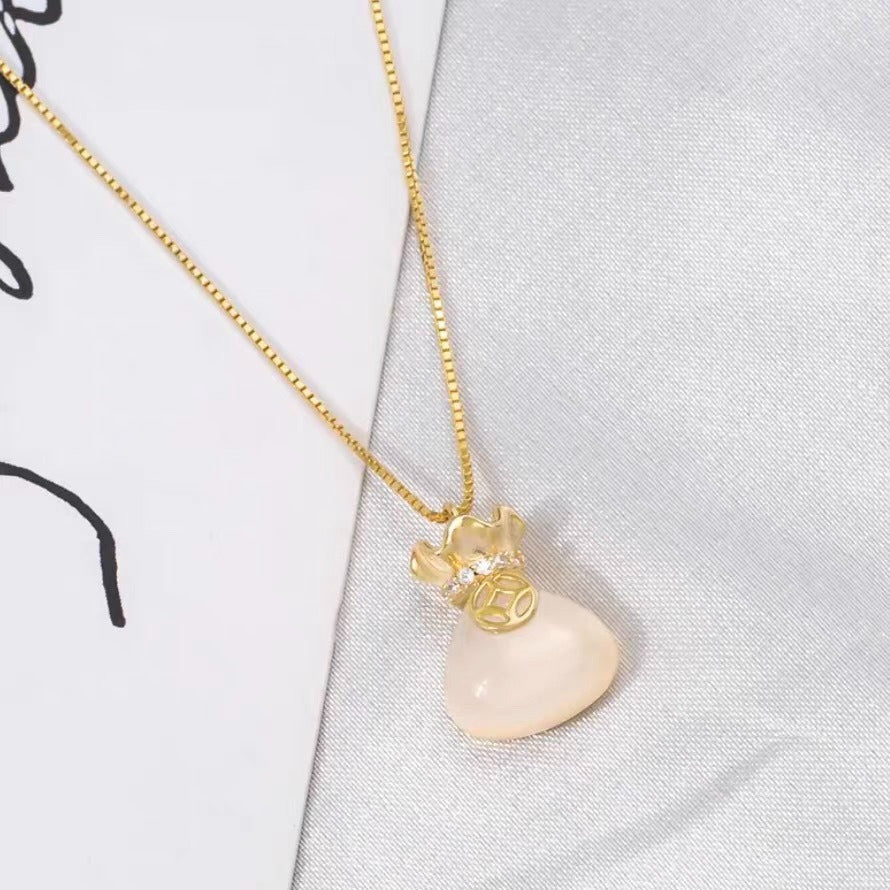 Sac porte-bonheur léger, tempérament de luxe, colliers au design polyvalent